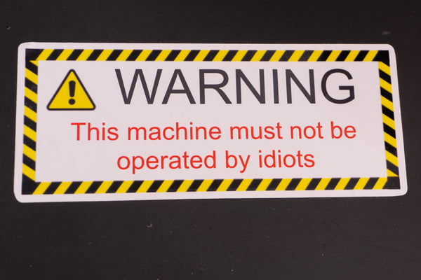 Funny Warning Sticker - This Machine must not be operated by idiots